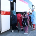 Foto Nicoloro G.   25/09/2023   Porto Corsini  ( RA )   Ha attraccato alla banchina di Porto Corsini (RA) la nave Life Support di Emergency con 28 migranti a bordo, di cui 11 adulti, nove donne e 8 minori accompagnati. La maggior parte di origine siriana e cinque libici. Appena sbarcati sono stati trasferiti su un autobus della Croce Rossa e portati all' ospedale di Ravenna per accertamenti e identificazione. nella foto i naufraghi appena sbarcati vengono accompagnati sull' autobus della Croce Rossa che li portera' all' ospedale di Ravenna per accertamenti accurati ed identificazione.