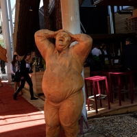 Foto Nicoloro G.   05/05/2015    Milano   Expo Milano 2015 si apre al mondo e si mette in mostra. nella foto una statua in legno davanti al Caffè Tirolese.