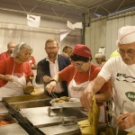 Foto Nicoloro G.   08/09/2023   Ravenna   Festa Nazionale dell' Unita'.  nella foto Peppe Provenzano saluta i volontari nelle cucine della Festa tra strette di mano e assaggio di pietanze.