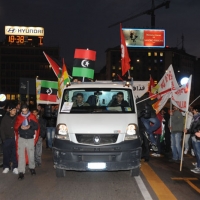 Foto Nicoloro G. 04/03/2011 Milano Manifestazione in piazza Loreto con corteo di un centinaio di immigrati libici contro il regime di Gheddafi a cui hanno partecipato anche immigrati tunisini ed egiziani. nella foto Manifestanti con striscioni e bandiere