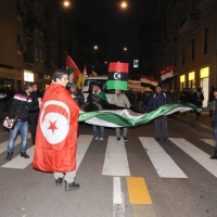 Foto Nicoloro G. 04/03/2011 Milano Manifestazione in piazza Loreto con corteo di un centinaio di immigrati libici contro il regime di Gheddafi a cui hanno partecipato anche immigrati tunisini ed egiziani. nella foto Manifestanti con striscioni e bandiere