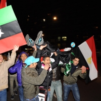 Foto Nicoloro G. 04/03/2011 Milano Manifestazione in piazza Loreto con corteo di un centinaio di immigrati libici contro il regime di Gheddafi a cui hanno partecipato anche immigrati tunisini ed egiziani. nella foto Manifestanti con bandiere