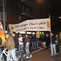 Foto Nicoloro G. 04/03/2011 Milano Manifestazione in piazza Loreto con corteo di un centinaio di immigrati libici contro il regime di Gheddafi a cui hanno partecipato anche immigrati tunisini ed egiziani. nella foto Manifestanti con un grande striscione