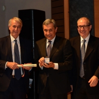 Foto Nicoloro G.  07/12/2014    Milano    Tradizionale cerimonia della consegna degli Ambrogini da parte del Comune di Milano. nella foto il prefetto Alessandro Marangoni tra il sindaco Giuliano Pisapia e il presidente del Consiglio comunale Basilio Rizzo.