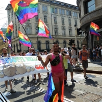 Foto Nicoloro G.   27/06/2015  Milano    Dodicesima edizione del " Milano Gay Pride " che con lo slogan " I diritti nutrono il pianeta " ha visto sfilare in corteo 100.000 partecipanti. nella foto un partecipante lungo il corteo.