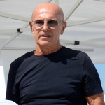 Foto Nicoloro G.   15/08/2019  Cervia ( Ra )   27° edizione di ' Cervia, la spiaggia ama il libro ' con il tradizionale sbarco degli scrittori dalle imbarcazioni storiche. nella foto Arrigo Sacchi.