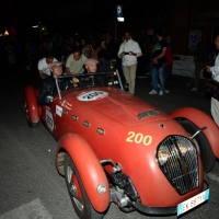 Foto Nicoloro G.  14/05/2015  Rimini     Arriva a Rimini la prima tappa della 33° edizione della 1000 Miglia. La storica competizione partita da Brescia si snoda su un percorso di 1760 chilometri con la partecipazione di 438 vetture e 42 Nazioni. nella foto l' arrivo a Rimini, con problemi di ripartenza, di Joe Bastianich su una Healey 2400 Silverstone del 1959.