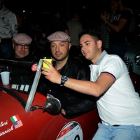 Foto Nicoloro G.  14/05/2015  Rimini     Arriva a Rimini la prima tappa della 33° edizione della 1000 Miglia. La storica competizione partita da Brescia si snoda su un percorso di 1760 chilometri con la partecipazione di 438 vetture e 42 Nazioni. nella foto l' arrivo a Rimini di Joe Bastianich che fa un selfie con un fan.