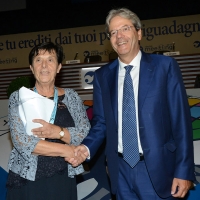 Foto Nicoloro G. 20/08/2017 Rimini Giornata inaugurale della 38° edizione del Meeting di Rimini che quest\' anno ha come tema \' Quello che tu erediti dai tuoi padri, riguadagnatelo, per possederlo”. nella foto il presidente del Consiglio Paolo Gentiloni con Emilia Guarnieri, presidente Fondazione Meeting.