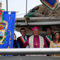 Foto Nicoloro G.  20/05/2012 Cervia (FC) Nell’ ambito delle manifestazioni per i Cento anni di Milano Marittima si e’ svolta nelle acque antistanti il porto di Cervia la 586° edizione dello Sposalizio del Mare alla presenza dell’ assessore al Turismo del Comune di Milano, citta’ ospite e gemellata. Questo antico rito risale al 1445 e con esso Cervia si ” congiunge ” simbolicamente con il mare che la bagna e lo ringrazia per i doni che le offre: la pesca, il famoso sale ed oggi anche il turismo. nella foto L'Arcivescovo di Ravenna Giuseppe Verucchi – Franco D' Alfonso – Roberto Zoffoli