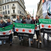 Foto Nicoloro G. 01/05/2016 Manifestazione con corteo per la ricorrenza del I° Maggio. nella foto bandiere e striscioni di dissidenti iraniani.