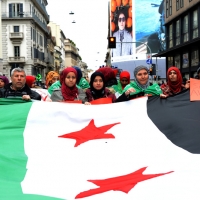 Foto Nicoloro G. 01/05/2016 Manifestazione con corteo per la ricorrenza del I° Maggio. nella foto bandiere e striscioni di dissidenti iraniani.