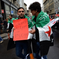 Foto Nicoloro G. 01/05/2016 Manifestazione con corteo per la ricorrenza del I° Maggio. nella foto bandiere e striscioni di dissidenti iraniani.