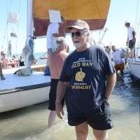 Foto Nicoloro G. 15/08/2016 Cervia ( Ravenna ) Ventiquattresima edizione di \' Cervia, la spiaggia ama il libro \', manifestazione che culmina il giorno di Ferragosto con il tradizionale sbarco degli scrittori sulla spiaggia a bordo di antiche imbarcazioni. nella foto il giornalista e scrittore Italo Cucci presente con il libro \' Ferrari segreto \'.