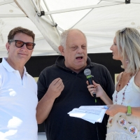 Foto Nicoloro G. 15/08/2016 Cervia ( Ravenna ) Ventiquattresima edizione di \' Cervia, la spiaggia ama il libro \', manifestazione che culmina il giorno di Ferragosto con il tradizionale sbarco degli scrittori sulla spiaggia a bordo di antiche imbarcazioni. nella foto gli scrittori Roberto Balzani, a sinistra, e Giancarlo Mazzuca presenti con il libro scritto a quattro mani \' Amarcord Romagna \' intervistati dalla giornalista Francesca Cantiani.