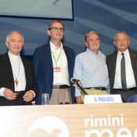 Foto Nicoloro G. 24/08/2016 Rimini Sesta giornata della trentasettesima edizione del Meeting di Rimini che ha per titolo ' Tu sei un bene per me '. Inaugurata dal Capo dello Stato questa manifestazione si svolge per sette giorni tra incontri, dibattiti, mostre. nella foto da sinistra Mons. Silvano Maria Tomasi, Giorgio Paolucci, Romano Prodi e Naguib Sawiris.