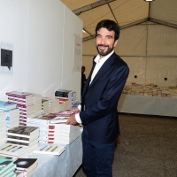 Foto Nicoloro G. 30/08/2018 Ravenna Continua la Festa Nazionale de l' Unita'. nella foto il segretario PD Maurizio Martina, nella libreria della Festa dove compera alcuni libri.