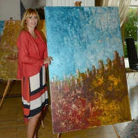 Foto Nicoloro G. 08/07/2016 Milano Marittima ( Ravenna ) L\' europarlamentare Alessandra Mussolini inaugura al Palace Hotel di Milano Marittima una mostra di suoi dipinti dal titolo \' Graffi \'. nella foto Alessandra Mussolini con uno dei suoi dipinti esposti.
