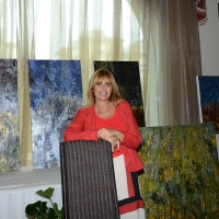Foto Nicoloro G. 08/07/2016 Milano Marittima ( Ravenna ) L\' europarlamentare Alessandra Mussolini inaugura al Palace Hotel di Milano Marittima una mostra di suoi dipinti dal titolo \' Graffi \'. nella foto Alessandra Mussolini con alcuni dei suoi dipinti.