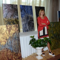 Foto Nicoloro G. 08/07/2016 Milano Marittima ( Ravenna ) L\' europarlamentare Alessandra Mussolini inaugura al Palace Hotel di Milano Marittima una mostra di suoi dipinti dal titolo \' Graffi \'. nella foto Alessandra Mussolini con alcuni dei suoi dipinti.