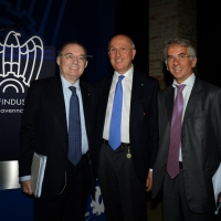 Foto Nicoloro G.  12/06/2015   Ravenna   Assemblea generale della Confindustria di Ravenna, sul tema " Impresa e Giustizia ", nell' ambito dei festeggiamenti per i 70 anni dell' Organizzazione ravennate. nella foto da sinistra il presidente di Confindustria Giorgio Squinzi, il presidente ABI Antonio Patuelli e il sottosegretario alla Giustizia Cosimo Maria Ferri.