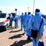 Foto Nicoloro G.   16/07/2025   Ravenna   E' attraccata  al porto di Ravenna la nave ong Ocean Viking con a bordo soltanto 16 migranti salvati davanti alle coste libiche. nella foto alcuni migranti su un pulmino della CRI che li portera' in un centro dove saranno sottoposti ad accurati esami medici e all' identificazione.