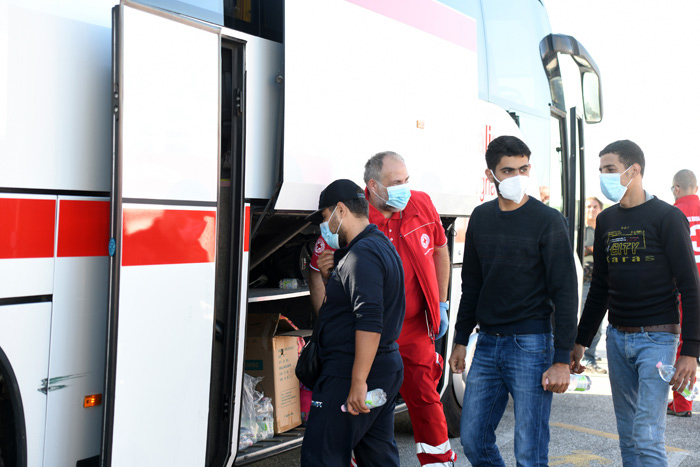 Foto Nicoloro G.   25/09/2023   Porto Corsini  ( RA )   Ha attraccato alla banchina di Porto Corsini (RA) la nave Life Support di Emergency con 28 migranti a bordo, di cui 11 adulti, nove donne e 8 minori accompagnati. La maggior parte di origine siriana e cinque libici. Appena sbarcati sono stati trasferiti su un autobus della Croce Rossa e portati all' ospedale di Ravenna per accertamenti e identificazione. nella foto i migranti appena sbarcati vengono accompagnati sull' autobus della Croce Rossa che li portera' all' ospedale di Ravenna per accertamenti accurati ed identificazione.