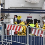 Foto Nicoloro G.   25/04/2023   Porto Corsini ( Ravenna )   E' attraccata al molo di Porto Corsini la MV Humanity 1 con a bordo 69 miigranti, di cui 39 provenienti dal Sudan, e i rimanenti da diversi paesi dell' Africa. Tra tutti si contano una sola donna e 20 minori non accompagnati. nella foto un gruppo di migranti in attesa di essere sbarcati.