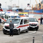 Foto Nicoloro G.   30/10/2023   Ravenna      Sbarcata a Marina di Ravenna la nave Ocean Viking con a bordo 47 migranti di cui 29 tratti in salvo al largo della Libia e 18 soccorsi durante la navigazione verso Ravenna. Tra tutti ci sono 11 minori non accompagnati di cui due saranno destinati a Matera  in una struttura del progetto FAMI. nella foto alcuni pulmini della Croce Rossa portano i migranti sbarcati in una strutture fuori Ravenna per i controlli di rito.