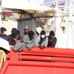 31/12/2022   Porto Corsini ( Ravenna )   La nave Ocean Viking con 113 migranti a bordo ha attraccato alla banchina del Terminal Crociere di Porto Corsini. nella foto alcuni migranti in attesa di sbarcare.