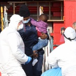 Foto Nicoloro G.   31/12/2022   Porto Corsini ( Ravenna )   La nave Ocean Viking con 113 migranti a bordo ha attraccato alla banchina del Terminal Crociere di Porto Corsini. nella foto lo sbarco di una donna con figlio.
