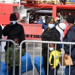 Foto Nicoloro G.   31/12/2022   Porto Corsini ( Ravenna )   La nave Ocean Viking con 113 migranti a bordo ha attraccato alla banchina del Terminal Crociere di Porto Corsini. nella foto sbarcano alcune donne con figli.