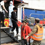 Foto Nicoloro G.   25/05/2024   Ravenna   E' approdata nel porto di Ravenna la nave ong Sea Eye con a bordo 52 migranti di cui 6 minori. nella foto lo sbarco di alcuni dei sei minori presenti a bordo.