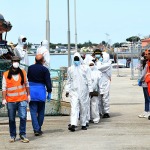 Foto Nicoloro G.   13/05/2025   Ravenna   E\' approdata nel porto di Ravenna la nave ong tedesca Humanity 1 con a bordo 125 migranti. Tra tutti anche 4 donne e circa 50 minori non accompagnati. La maggior parte provenienti dall\' Eritrea e dall\' Etiopia, ma anche dal Sudan, dall\' Efitto e dal Pakistan. Nei racconti dei migranti le testimonianze delle tante difficolta\' per sfuggire alle guerre prima e alle torture dei libici dopo. Alcuni hanno raccontato di essere stati rapiti e venduti come schiavi. nella foto un momento dello sbarco.