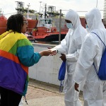Foto Nicoloro G.   13/05/2025   Ravenna   E' approdata nel porto di Ravenna la nave ong tedesca Humanity 1 con a bordo 125 migranti. Tra tutti anche 4 donne e circa 50 minori non accompagnati. La maggior parte provenienti dall' Eritrea e dall' Etiopia, ma anche dal Sudan, dall' Efitto e dal Pakistan. Nei racconti dei migranti le testimonianze delle tante difficolta' per sfuggire alle guerre prima e alle torture dei libici dopo. Alcuni hanno raccontato di essere stati rapiti e venduti come schiavi. nella foto due volontarie danno ad ogni migrante una cartolina con i numeri telefonici in caso di emergenza.