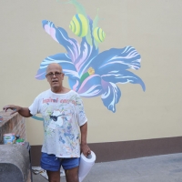 Foto Nicoloro G. 15/09/2011 Dozza ( Bologna ) Ventitreesima edizione della Biennale del Muro Dipinto, manifestazione di arte contemporanea che vede impegnati alcuni artisti scelti tra numerosi che propongono bozzetti per ornare le facciate delle case del borgo medievale in provincia di Bologna. Iniziativa nata nel 1960 e che vede il contributo del Museo d’ Arte Moderna di Bologna. nella foto Bruno Benuzzi