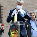Foto Nicoloro G.   01/05/2020   Ravenna   Celebrazione del Primo Maggio. Con il messaggio ' Il lavoro in sicurezza per costruire il futuro ' si e' svolta la celebrazione della Festa dei lavoratori in una piazza praticamente deserta come voluto dalle disposizioni vigenti. nella foto la disinfettazione del microfono prima di ogni  nuovo intervento.