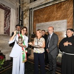 Foto Nicoloro G.   13/09/2026   Ravenna   Nell' ambito delle celebrazioni per il 705° annuale della morte di Dante Alighieri si e' svolta la tradizionale cerimonia dell' offerta da parte della citta' di Firenze dell' olio che alimentera' la lampada che illumina perennemente la tomba del Sommo Poeta. nella foto la vicesindaca di Firenze Paola Galgani accende la lampada che illumina sempre la tomba di Dante.