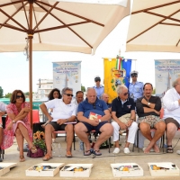 Foto Nicoloro G.  15/08/2012 Cervia (Ravenna)  Diciottesima edizione di ”Cervia, la spiaggia ama il libro“, tradizionale appuntamento di Ferragosto che vede gli scrittori sbarcare sulla spiaggia di Cervia portati da antiche barche a vela. nella foto Gli scrittori sul palco