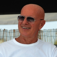 Foto Nicoloro G.  15/08/2015   Cervia ( Ravenna )  Ventitreesima edizione di " Cervia, la spiaggia ama il libro ", con il tradizionale sbarco degli scrittori sulla spiaggia della cittadina romagnola. nella foto l' ex c.t. della nazionale di calcio Arrigo Sacchi, presente con il libro " Calcio totale ".