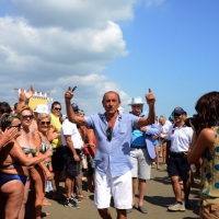 Foto Nicoloro G. 15/08/2013 Cervia ( Ravenna ) Ventunesima edizione di " Cervia, la spiaggia ama il libro " che si conclude il giorno di Ferragosto con il tradizionale sbarco degli scrittori sulla spiaggia davanti al Grand Hotel della cittadina romagnola. nella foto Raul Casadei