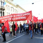 Foto Nicoloro G.   01/05/2022   Milano  Corteo del 1° Maggio all' insegna della Pace e dei Diritti sul Lavoro. nella foto striscioni e bandiere lungo il corteo.