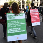Foto Nicoloro G.   01/05/2022   Milano  Corteo del 1° Maggio all' insegna della Pace e dei Diritti sul Lavoro. nella foto striscioni e bandiere lungo il corteo.