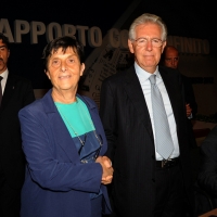 Foto Nicoloro G. 19/08/2012 Rimini Trentatreesima edizione del Meeting di Rimini, organizzato da Comunione e Liberazione, dal titolo ” La natura dell’ uomo e’ rapporto con l’ infinito “. nella foto Emilia Guarnieri – Mario Monti
