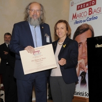 Foto Nicoloro G. 16/03/2012 Bologna Si e' svolta nella sede centrale di Bologna de " Il Resto del Carlino " la sesta edizione del " Premio Marco Biagi ", il giuslavorista ucciso dalle Nuove Brigate Rosse il 19 marzo 2002. nella foto Elsa Fornero ed un premiato