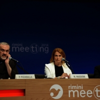 Foto Nicoloro G.  24/08/2014  Rimini   XXXV edizione del Meeting per l' amicizia fra i popoli. nella foto da sinistra padre Pierbattista Pizzaballa, custode di Terrasanta, che ha preso parte all' incontro dal titolo " Il potere del cuore. Ricercatori di Verità ", la giornalista Monica Maggioni, che ha condotto l' incontro e Emilia Guarnieri, presidente della Fondazione Meeting.