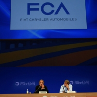 Foto Nicoloro G. 30/08/2014 Rimini Settima ed ultima giornata della XXXV edizione del Meeting per l' amicizia fra i popoli. nella foto il nuovo marchio della Casa Automobilistica e al tavolo Sergio Marchionne e Bernhard Scholz, presidente della Compagnia delle Opere.