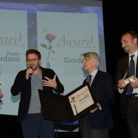 Foto Nicoloro G.  24/06/2015  Milano    Terza serata della sedicesima edizione de \" La Milanesiana \" che ha per titolo \" Manie e ossessioni \". nella foto lo scrittore Paolo Giordano riceve il \" Premio Montblanc - La Milanesiana \" dalle mani di Ferruccio de Bortoli tra Elisabetta Sgarbi e il direttore marketing della Montblanc Marco Ravasi.