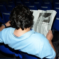 Foto Nicoloro G.  20/08/2015  Rimini,  Al via l'edizione 2015 del Meeting di CL dal titolo 'Di che è mancanza questa mancanza, cuore, che a un tratto ne sei pieno?'. nella foto un partecipante al meeting intento a leggere il messaggio che Papa Francesco ha inviato al Meeting.