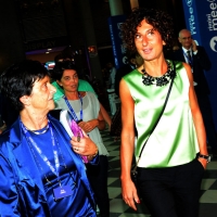 Foto Nicoloro G.   21/08/2015    Rimini  Seconda giornata dell' edizione 2015 del Meeting di C.L. dal titolo ' Di che è mancanza questa mancanza, cuore, che a un tratto ne sei pieno ? '. nella foto la moglie del presidente del Consiglio Agnese Landini in visita al Meeting accolta dal presidente Fondazione Meeting Emilia Guarnieri.